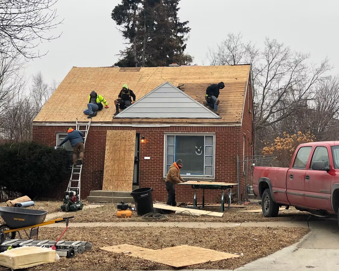 Roof after replacement — new dark architectural shingles